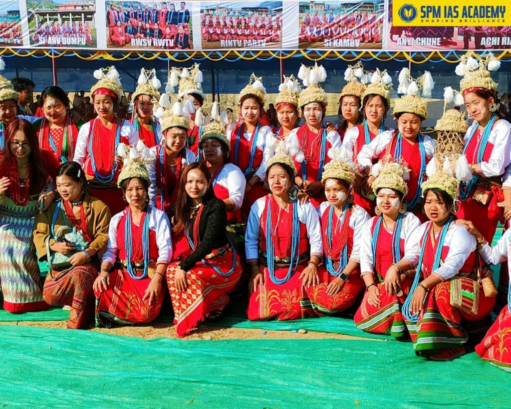 Tagin tribe men and women in traditional attire celebrating Si Donyi Hilo Festival in Arunachal Pradesh